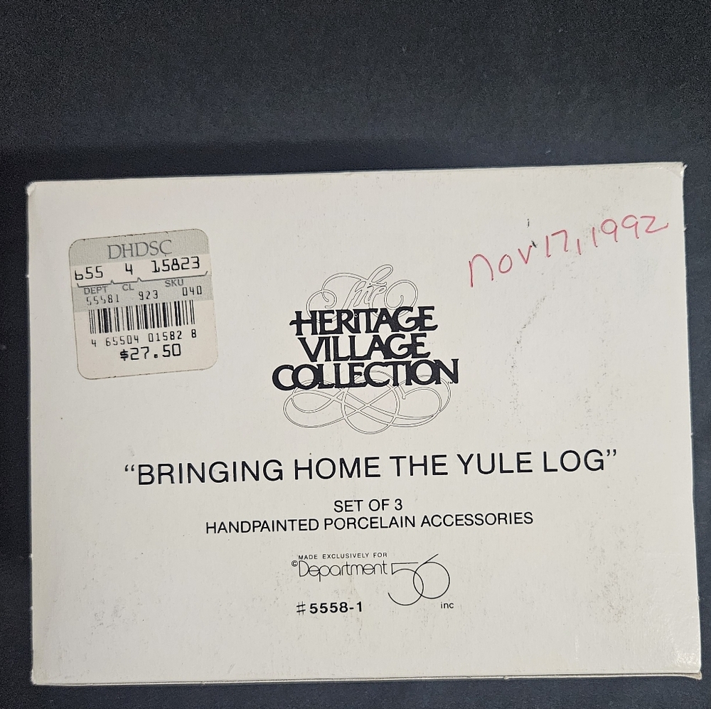 Department 56 - Heritage Village Collection "Bringing Home The Yule Log" #5558-1
